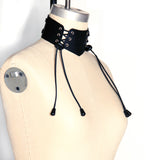 Dressform at an angle wearing a Laced Front Choker. Angle highlights the silver grommets and bungee cord laces.