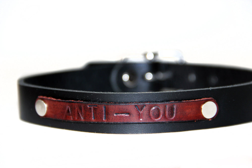 Anti-You choker front view. Black choker with dark red anti-you plate