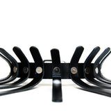 Closeup of choker shows that each leather spine is attached to the choker base with silver rivets.