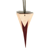 Deco triangle necklace with natural and chestnut brown leather, close up view