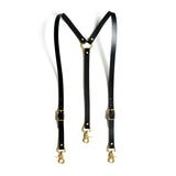 Black leather suspenders with brass swivel trigger clips.