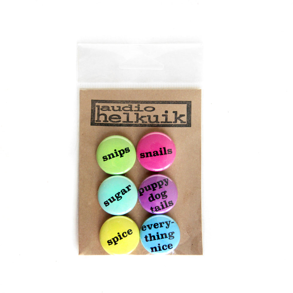 Pin set in the confetti color way which includes lemon yellow, mint, sky blue, orchid and magenta. Shown in branded packaging.