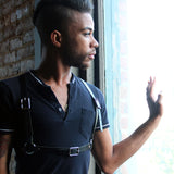 Black leather half suspender harness on model, front view