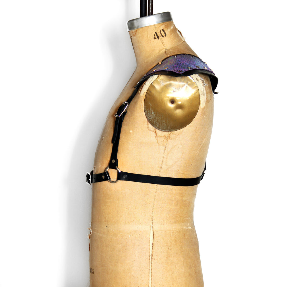 Black leather half suspender harness with silver hardware and mermaid leather triangle sholders, side view