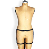 Black hip harness with mermaid leather triangles, front view