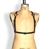 Half suspender harness with mermaid leather triangles on each strap